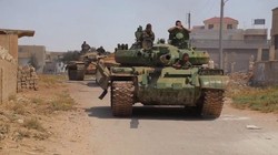 Xe tăng quân đội Syria trên chiến trường Daraa. Ảnh minh họa Masdar News