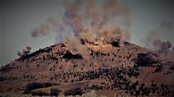 Pháo binh lực lượng Tiger bắn phá cao điểm Tal-Harrah, chuẩn bị tiến công. Ảnh video