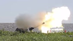 Pháo binh quân dội Syria hoạt động trên chiến trường Daraa. Ảnh minh họa South Front