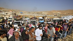 Những người di tản Syria bắt đầu trở về Đông Ghouta, ngoại ô Damascus