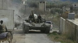 Quân đội Syria trên chiến trường vùng nông thôn Latakia. Ảnh minh họa Masdar News