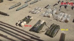 Vũ khí chiến lợi phẩm của quân đội Syria, thu giữ được ở Hama, Sweida và DeirEzzor. Ảnh minh họa video SANA