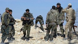 Lực lượng vũ trang địa phương NDF trên chiến trường Lattakia. Syria. Ảnh minh họa: Masdar News.