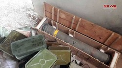 Kho vũ khí mới được quân đội Syria phát hiện trên vùng ngoại ô Damascus. Ảnh: SANA.