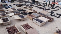 Kho vũ khí khổng lồ của FSA ở thị trấn Barzeh bị quân đội Syria thu giữ. Ảnh minh họa video SANA