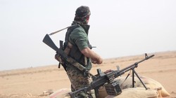 Chiến binh người Kurd trên chiến trường Afrin, tây bắc Aleppo. Ảnh minh họa: Masdar News.