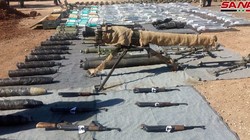 Quân dội Syria thu giữ vũ khí của lực lượng Hồi giáo cực đoan ở Damascus, Quneitra. Ảnh SANA.