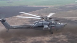 Trực thăng Thợ săn đêm Mi 28N tấn công mục tiêu bằng rocket.