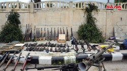 Quân đội Syria thu vũ khí trang bị cất giấu bí mật của lực lượng Hồi giáo cực đoan ở SANA. Ảnh SANA