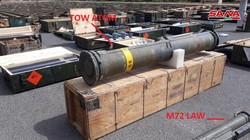 Các loại vũ khí đạn dược,trong đó có cả tên lửa chống tăng TOW do Mỹ sản xuất bị thu giữ trên vùng ngoại ô Damascus. Ảnh SANA