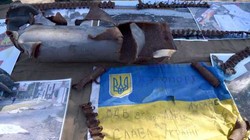 Triển lãm chứng tích chiến tranh do chính quyền Kiev gây ra trong chiến dịch trừng phạt Donbass. Ảnh: Rusvesna.