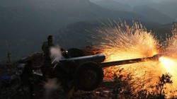 Pháo binh quân đội Syria đánh phá ác liệt chiến tuyến của thánh chiến ở khu phi quân sự. Ảnh minh họa Masdar News