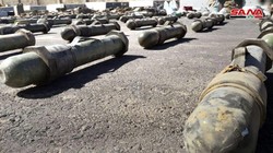Vũ khí trang bị do quân đội Syria thu giữ được trên vùng ngoại ô Damascus. Ảnh: SANA.