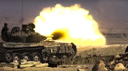 Xe tăng quân đội Syria pháo kích. Ảnh Al-Masdar News
