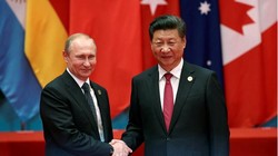 Tổng thống Nga Vladimir Putin và Chủ tịch Trung Quốc Tập Cận Bình bên lề Hội nghị thượng đỉnh G20. Ảnh: Reuters/Đa Chiều.