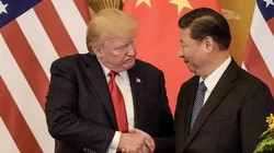 Tổng thống Mỹ Donald Trump và Chủ tịch Trung Quốc Tập Cận Bình. Ảnh: The Japan Times.