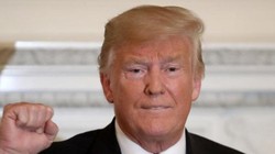 Tổng thống Mỹ Donald Trump quyết không để Trung Quốc lớn mạnh vượt Mỹ. Ảnh: Toronto Star