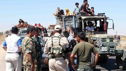 Người dân ở Daraa trở về nhà sau khi quân đội Syria đánh bại IS