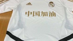 Các cầu thủ của Real Madrid sử dụng chiếc áo đặc biệt có in dòng khẩu hiệu người dân Trung Quốc chống lại virus Corona. Ảnh RM.