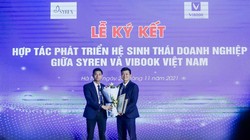 ông Nguyễn Nghĩa Vượng (bên phải) tại lễ ký kết hợp tác giữa Vibook và Syren