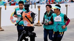 Robot hình người chạy bán marathon. Ảnh: Indian Today