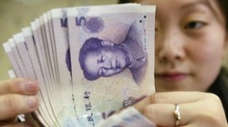 Nhân dân tệ là “giặc ngoài” khó lường nhất của VND trong 2016