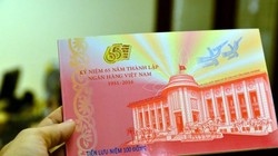 Một mẫu tiền lưu niệm được phát hành trong dịp kỷ niệm 65 thành lập ngành ngân hàng Việt Nam - Ảnh: LĐTĐ.