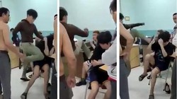 Hai thiếu niên 14 tuổi bị đấm đá dã man tại phòng giám thị Trường THCS Nguyễn Văn Tố, quận 10 (Ảnh cắt từ clip)