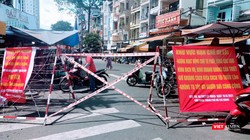 Phong toả khu chợ tự phát Xóm Chiếu để phòng dịch, thực hiện Chỉ thị 10 - Ảnh Hoà Bình