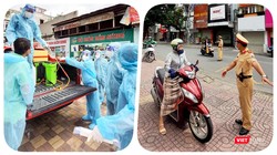 Đầu các tuyến đường đều có lực lượng kiểm tra giấy thông hành của người dân - Ảnh: Hoàng Anh 