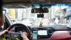 Xe Grab đang được thí điểm là xe hợp đồng điện tử