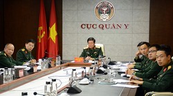 Thiếu tướng, PGS.TS Nguyễn Xuân Kiên cùng các thành viên Đoàn Việt Nam tại điểm cầu Hà Nội. Ảnh: Báo QĐND