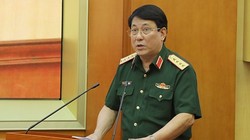 Đại tướng Lương Cường trình bày báo cáo tại hội nghị.