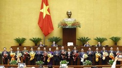 Chủ tịch nước Nguyễn Xuân Phúc, Thủ tướng Chính phủ Phạm Minh Chính, Chủ tịch Quốc hội Vương Đình Huệ và lãnh đạo Đảng, Nhà nước với các Phó Thủ tướng Chính phủ, một số Bộ trưởng và thành viên khác của Chính phủ vừa được Quốc hội phê chuẩn. Ảnh: TTXVN