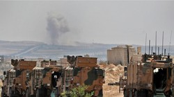 Một đoàn xe quân sự của Thổ Nhĩ Kỳ di chuyển ở tỉnh Idlib, giữa cuộc không kích mà lực lượng chính phủ thực hiện (Ảnh: AFP)