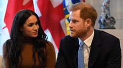 Vợ chồng Hoàng tử Harry trong một chuyến thăm Canada (Ảnh: Guardian)