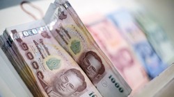 Đồng baht Thái Lan từ chỗ đồng tiền mạnh nhất trở thành đồng tiền yếu nhất châu Á trong năm nay (Ảnh: AsiaOne)