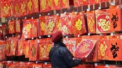 Người dân Trung Quốc được khuyến khích hạn chế di chuyển trong dịp Tết nguyên đán do dịch COVID-19 (Ảnh: SCMP)