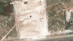 Ảnh vệ tinh cho thấy bãi đất mới mà Trung Quốc bồi đắp phi pháp trên đá Xu Bi (Ảnh: Handout)