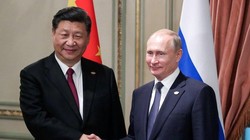 Quan hệ giữa Chủ tịch Tập Cận Bình và Tổng thống Vladimir Putin ngày càng trở nên thân thiết (Ảnh: TASS)