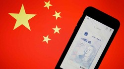 Việc mở rộng sử dụng đồng tiền số của Trung Quốc mang tới nhiều cơ hội, nhưng cũng không ít thách thức (Ảnh: Reuters)