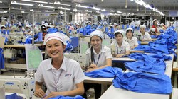 Công nhân lao động kỹ thuật của ngành dệt may Việt Nam (ảnh minh họa VietQ) 
