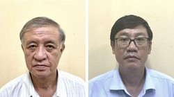 Các bị can Nguyễn Ngọc (trái) và Lê Quang Vinh.