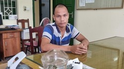 Phùng Văn Tú tại cơ quan công an.