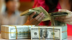 Áp lực tỷ giá nhìn từ động thái của các nước