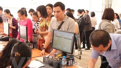 Thu ngân sách năm 2015 dự kiến vượt hơn 13% so với năm 2014. (Ảnh: PV/Vietnam+)