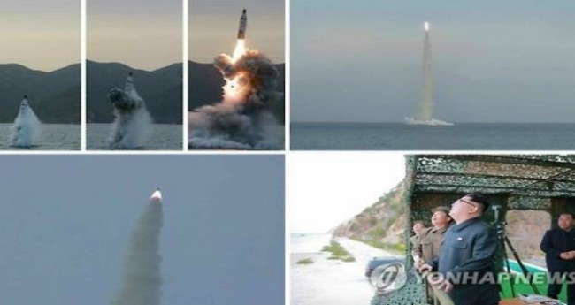 Kim Jong-un bị Phía Hàn Quốc cho rằng Triều Tiên đã báo cáo sai sự thật về vụ thử tên lửa đạn đạo từ tàu ngầm hôm 24/4 vừa qua. (Ảnh: Yonhap)
