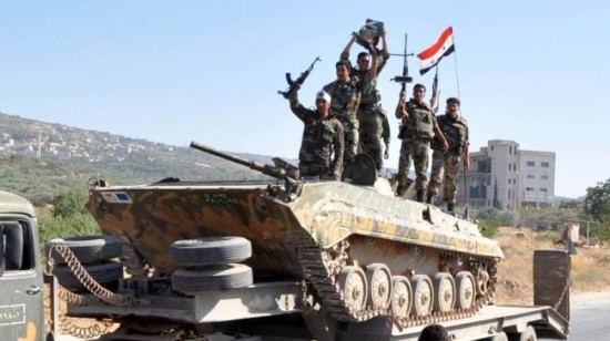 Quân đội Syria đánh chiếm một số cứ điểm ở Hama Binh sĩ quân đội Syria hành quân về vùng chiến sự tỉnh Hama