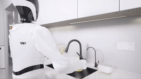 Robot biểu diễn rửa bát. Ảnh: QQnews. Rua bat.gif