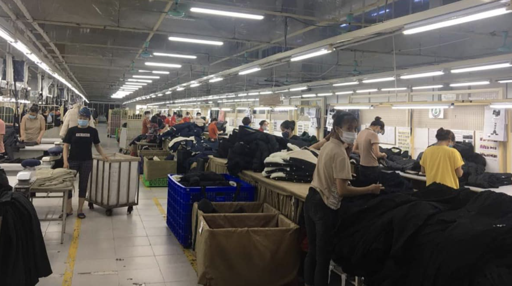 Công nhân làm việc trong công ty may ở Bắc Giang (Ảnh - Hoàng Dương)